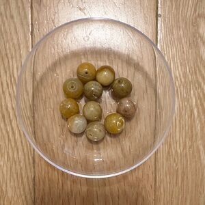 Olive colored glass beads - qty 11